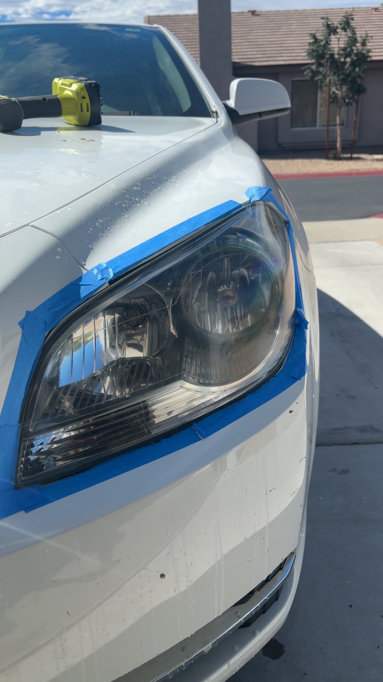 Headlight restoration process showing professional treatment
